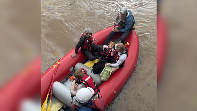 A Helene flooding rescue by the volunteer Walnut Fire Department swift water rescue team and French Broad Adventures.