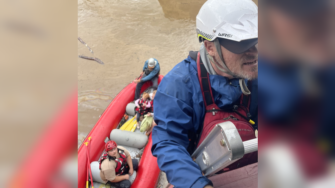 A Helene flooding rescue by the volunteer Walnut Fire Department swift water rescue team and French Broad Adventures.