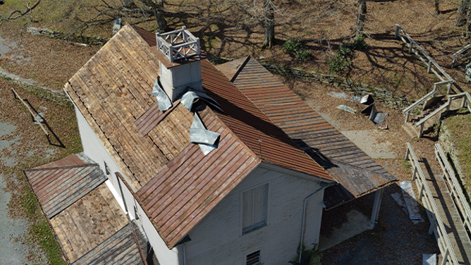 The Historic Carriage House at Moses Cone at Moses H. Cone Memorial Park sustained roof damaged during Hurricane Helene.