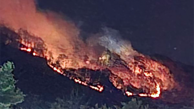 This photo shows a large fire burning on Lamentation Mountain in Berlin, Connecticut on Monday, October 21, 2024.