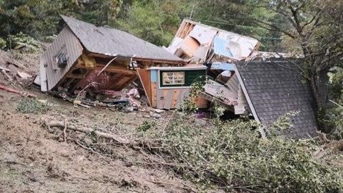 Donna and Michael Johns' home after the mudslide.