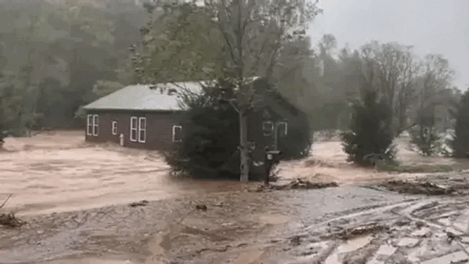 Video filmed by Vlado Novakovic shows floods encroaching on his home on September 26, and his house floating away the next day.