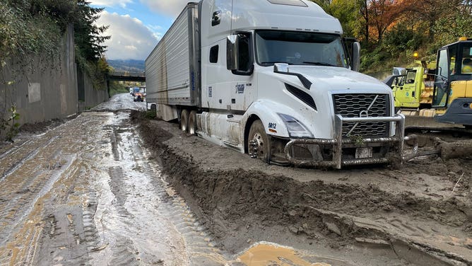 A semi-truck stuck in the debris from a landslide on I-5 near Bellingham, Washington on Oct. 27, 2024.