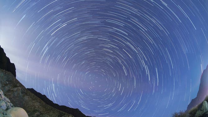 FILE - BAZHOU, CHINA - NOVEMBER 17, 2021 - Starry sky over Mount Hora in Mongolian Bayingoleng Autonomous Prefecture, Xinjiang Uygur Autonomous Region of Northwest China, in the early morning of November 17, 2021. On winter nights, the Leonid meteor shower comes. (Photo credit should be read via Getty Images)