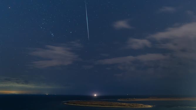 FILE- This photo taken on Nov. 17, 2022 shows the Leonid meteor shower pictured at the seaside of Vladivostok, Russia.