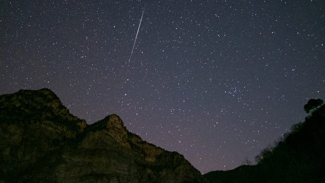 FILE- BEIJING, CHINA - JANUARY 03: A shooting star of the Geminid meteor shower is pictured on January 3, 2022 in Beijing, China.