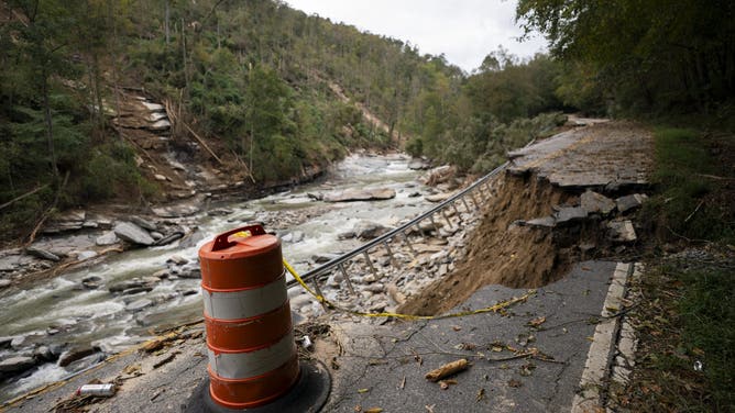 BAT CAVE, NORTH CAROLINA - OCTOBER 1: North Carolina Route 9 in the aftermath of Hurricane Helene on October 1, 2024 in Bat Cave, North Carolina. The death toll has topped 140 people across the southeastern U.S. due to the storm, according to published reports, which made landfall as a category 4 storm on Thursday. Millions are without power and the federal government has declared major disasters in areas of North Carolina, Florida, South Carolina, Tennessee, Georgia, Virginia and Alabama, freeing up federal emergency management money and resources for those states, according to the reports. (Photo by Sean Rayford/Getty Images)