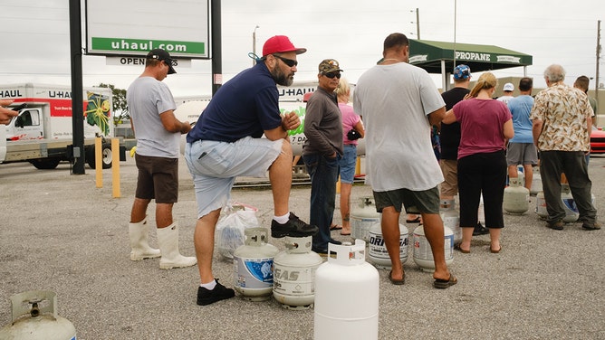 Residents line up for propane at a U-Haul location ahead of Hurricane Milton's expected landfall in St. Petersburg, Florida, US, on Monday, Oct. 7, 2024.