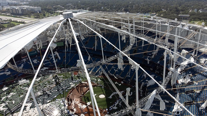 A drone image shows the dome of Tropicana Field ripped open due to Hurricane Milton in St. Petersburg, Florida on October 10, 2024.