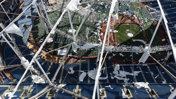 A drone image shows the dome of Tropicana Field ripped open by Hurricane Milton in St. Petersburg, Florida, on October 10, 2024.