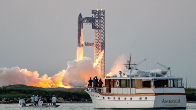 The SpaceX Starship lifts off from Starbase near Boca Chica, Texas, on October 13, 2024, for the Starship Flight 5 test. SpaceX successfully "caught" the first-stage booster of its Starship megarocket Sunday as it returned to the launch pad after a test flight, a world first in the company's quest for rapid reusability. (Photo by SERGIO FLORES / AFP)