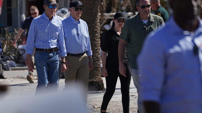 US President Joe Biden arrives to meet with first responders and local residents as he surveys damage caused Hurricane Milton in St. Pete Beach, Florida, on October 13, 2024. The death toll from Milton rose to at least 16, officials in Florida said October 11, and millions were still without power as residents began the painful process of piecing their lives back together. (Photo by Bonnie CASH / AFP) (Photo by BONNIE CASH/AFP via Getty Images)