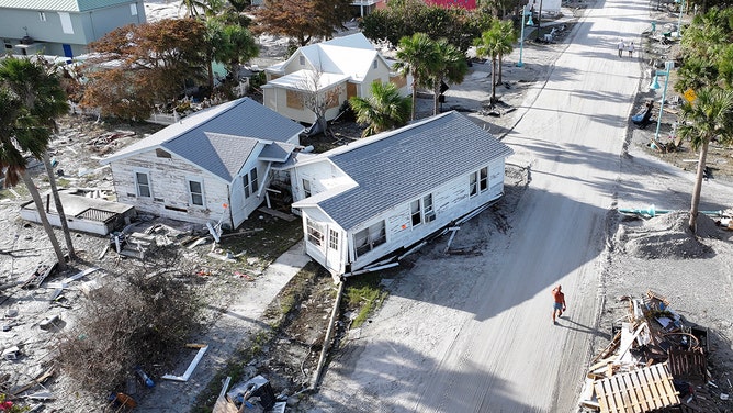 An aerial view of a home sitting on a road on October 13, 2024 in Manasota Key, Florida.