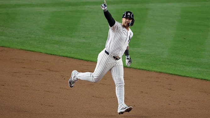 Gleyber Torres of the New York Yankees reacts after hitting a three-run home run in the eighth inning of game four of the 2024 World Series against the Los Angeles Dodgers on October 29, 2024 at Yankee Stadium in the Bronx borough of New York.