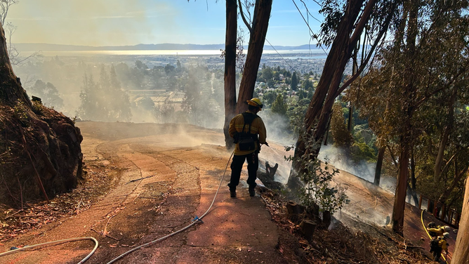 A pop-up fire outside of Oakland caused hundreds of people to be evacuated on Friday afternoon as multiple agencies worked to control the blaze.