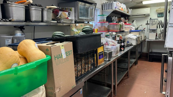 The Corner Kitchen restaurant in Asheville, North Carolina is seen in front of the damage caused by Hurricane Helene's flooding in western North Carolina.