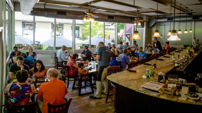 The Corner Kitchen restaurant in Asheville, North Carolina is seen in front of the damage caused by Hurricane Helene's flooding in western North Carolina.