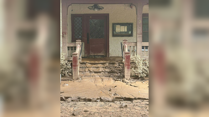 Damage caused by Hurricane Helene's flooding in western North Carolina is seen at the Corner Kitchen restaurant in Asheville, North Carolina.