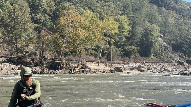 Jim Hampton, a member of the volunteer Walnut Fire Department swift water rescue team along the French Broad River.