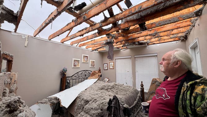 The roof of a home in Prairie Grove, Ark., was ripped off during storms.