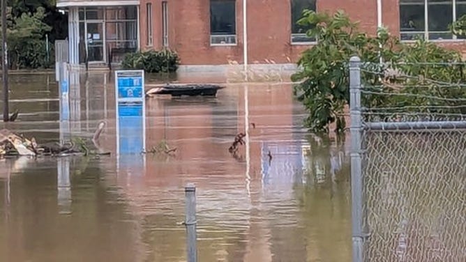 Floodwaters in Mikum Leah Webster's area in western North Carolina after Hurricane Helene.