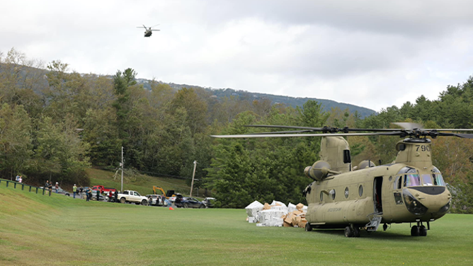 Soldiers assigned to the Connecticut, Maryland and North Carolina National Guard work together to distribute food and water to local first responders in Avery County on Sept 29, 2024. National Guard Aviation crews from Connecticut, Maryland, Pennsylvania and Iowa are supporting the NC Emergency Management and the NCNG in response to citizens affected by Helene. (U.S. Army National Guard photo by Sgt. 1st Class Leticia Samuels)