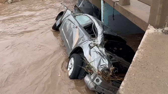 This photo shows a destroyed car after deadly flooding in Roswell, New Mexico, over the weekend.