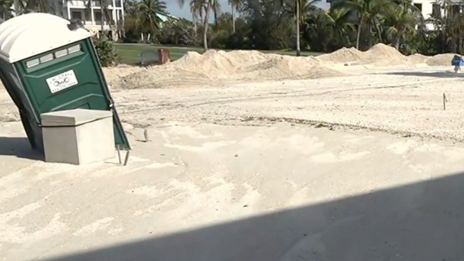 Roads in Bonita Springs were closed off due to sand making them impassable.