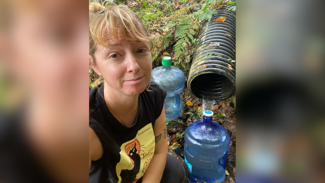 Windle, collecting water for animals in Farmshire after Helene.