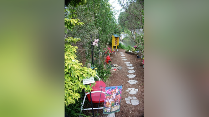 The River's Edge Dog Garden in front of Helene. The Broad River can be seen in the background.