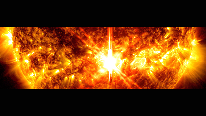 NASA's Solar Dynamics Observatory captured this image of an X9.0 solar flare - as seen in the bright flash at the center - on October 3, 2024. The image shows a mixture of 171 angstroms and 131 angstroms of light, subsets of extreme ultraviolet light. 