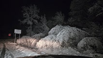 Northeast blasted by snow, beneficial rain as major airport hubs face Thanksgiving travel delays