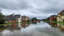 Heavy rainfall swamps roads in southern Louisiana causing flash flooding