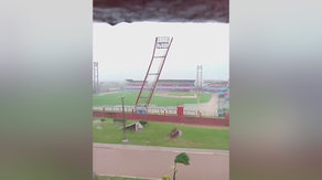 Watch as Hurricane Rafael's whipping winds topple stadium floodlights in Cuba