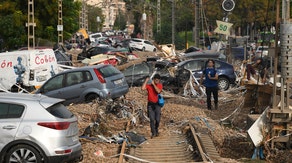 Over 200 dead after flooding sweeps across parts of Spain during historic rains