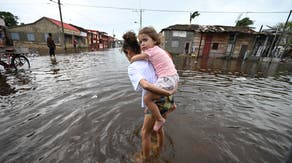 Rafael becomes post-tropical cyclone over Gulf as it brings life-threatening beach conditions to US coast