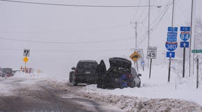 Northeast blasted by snow, beneficial rain as major airport hubs face travel delays