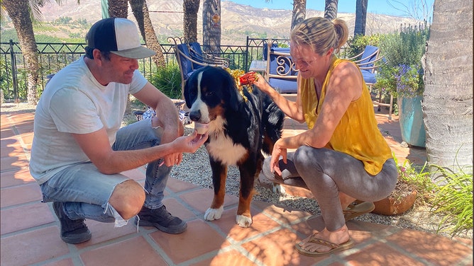 Andreas and Jessica with their first born canine "Miles."