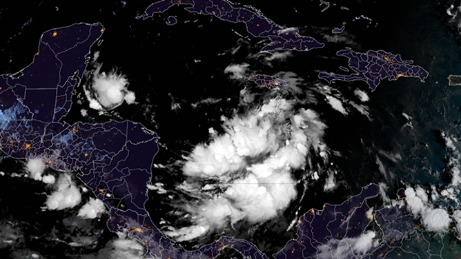 This graphic shows Invest 99L in the Caribbean Sea on the morning on Wednesday, Nov. 13, 2024.