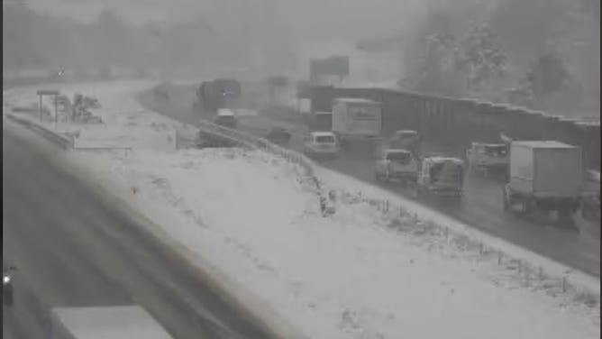 Snowfall along roadways.