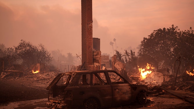 A house burns during the Mountain Fire in Camarillo, California, USA, on Wednesday, November 6, 2024.