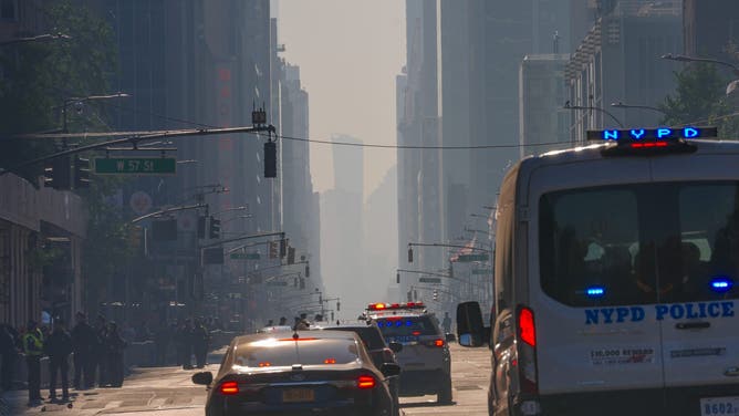 NEW YORK, UNITED STATES - NOVEMBER 09: Wildfires in New Jersey are leading to smoky skies and diminished air quality around the tri-state area of the East Coast in the United States. As dangerous air quality hits New York City, Mayor Eric Adams issued an air quality alert on Saturday, November 9, 2024. Adams bans grilling in city parks to prevent brush fires during drought conditions. (Photo by Selcuk Acar/Anadolu via Getty Images)