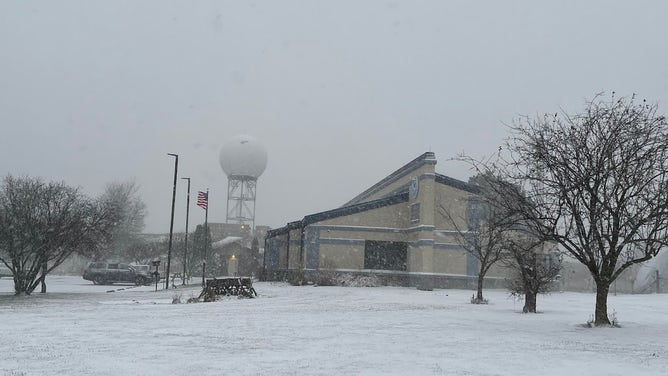 Snowfall outside the National Weather Service Milwaukee office on Thursday, Nov. 21, 2024.