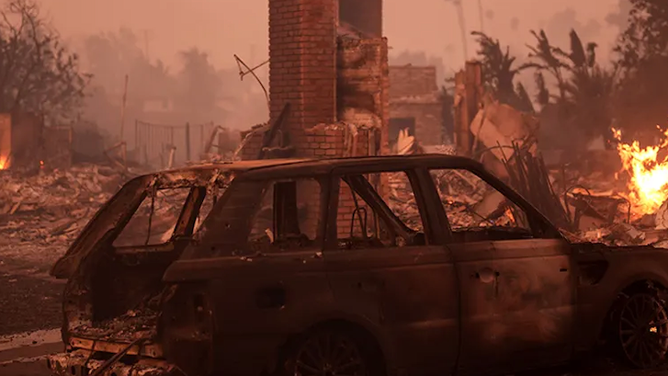 A house burns during the Mountain Fire in Camarillo, California, USA, on Wednesday, November 6, 2024.