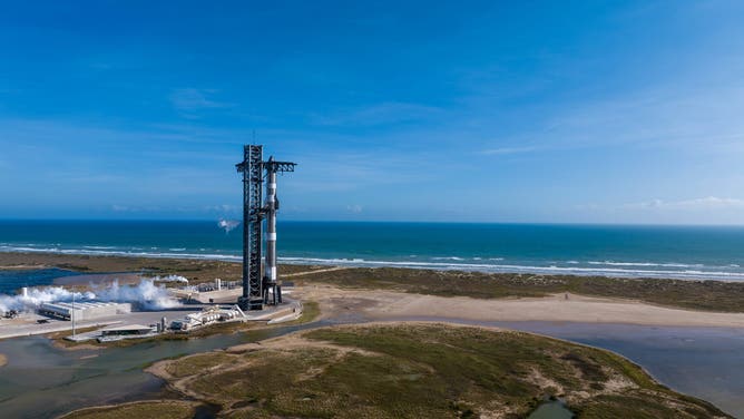 A SpaceX Starship and Super Heavy booster stacked at the company's South Texas launch site ahead of a planned sixth test flight on Nov. 19, 2024.