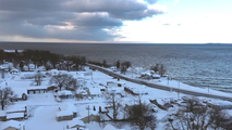 See It: Drone video shows frozen New York town buried by lake-effect snow