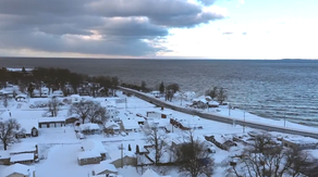 See It: Drone video shows frozen New York town buried by lake-effect snow