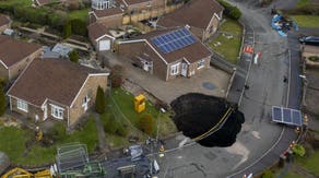 Massive sinkhole swallows road in Wales displacing residents ahead of Christmas