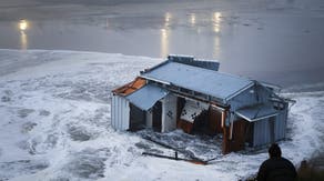 High surf turns deadly in California as powerful waves destroy part of Santa Cruz Pier, prompt water rescues