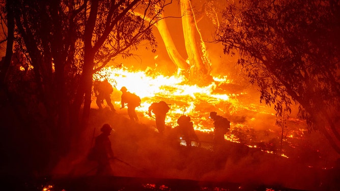 Over 1,000 first responders from multiple agencies are on the ground and in the air battling the Franklin Fire burning in Malibu, California, outside Los Angeles on Wednesday.
